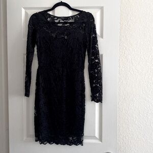 Black lace modi’s dress. Long sleeves. Size small. Worn once. Great condition.